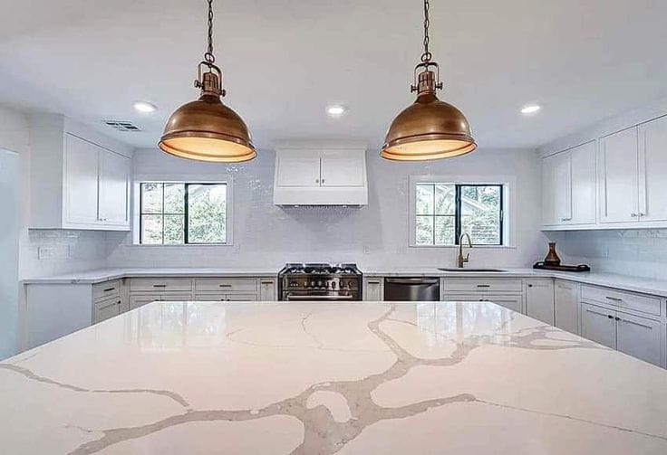 Finished Calacatta quartz countertop with polished eased edge